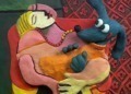 Colorful clay figures embracing in Talpy
