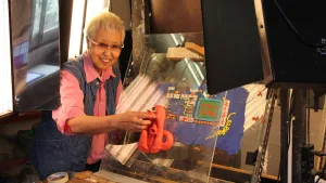 Animator Fusako Yusaki working with a clay figure